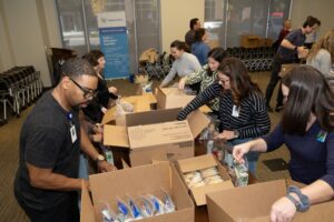 Lifepoint Health employees assist with Second Harvest Food Bank of Middle Tennessee food packing event.